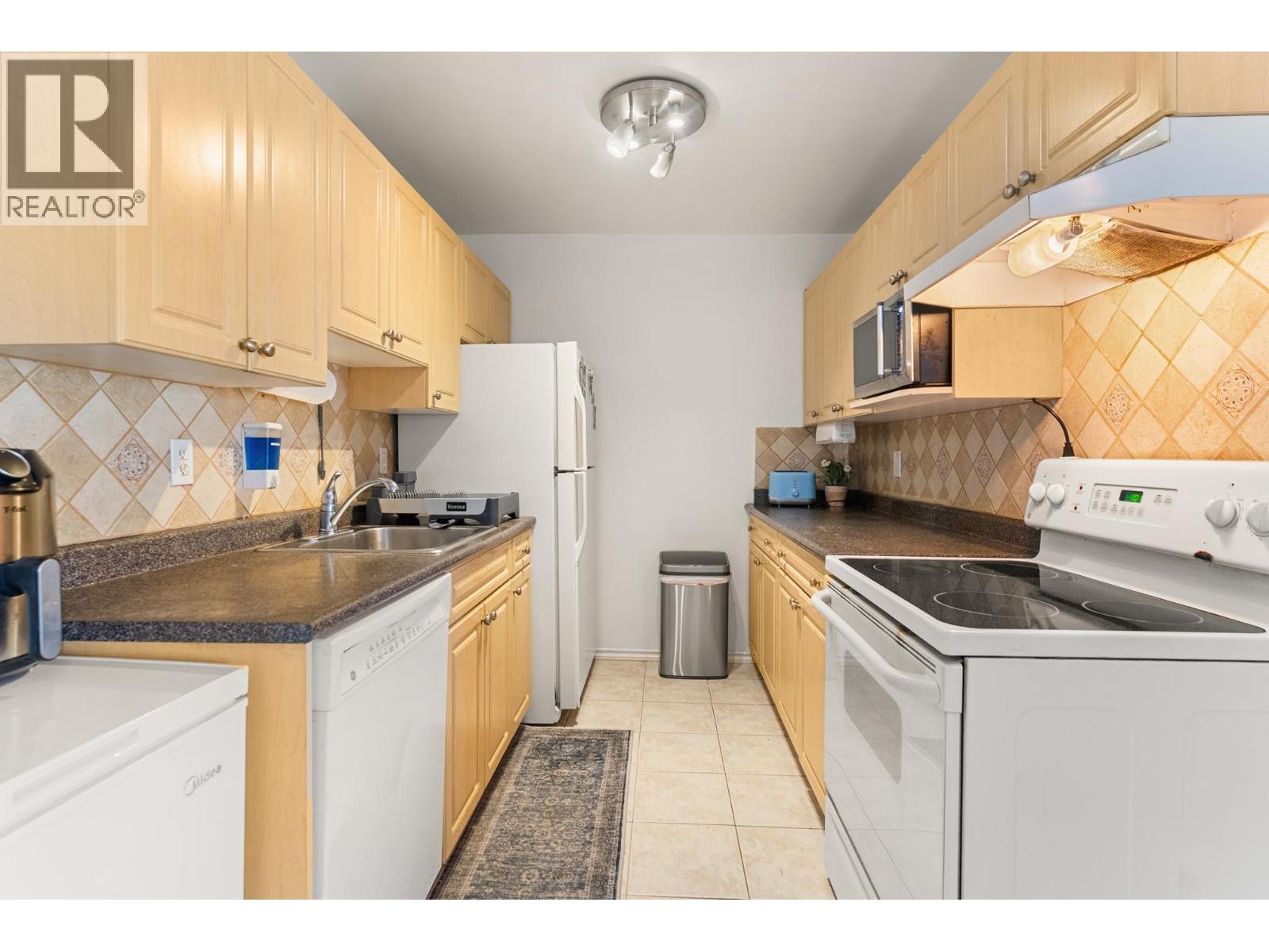 7240 LINDSAY Unit 306