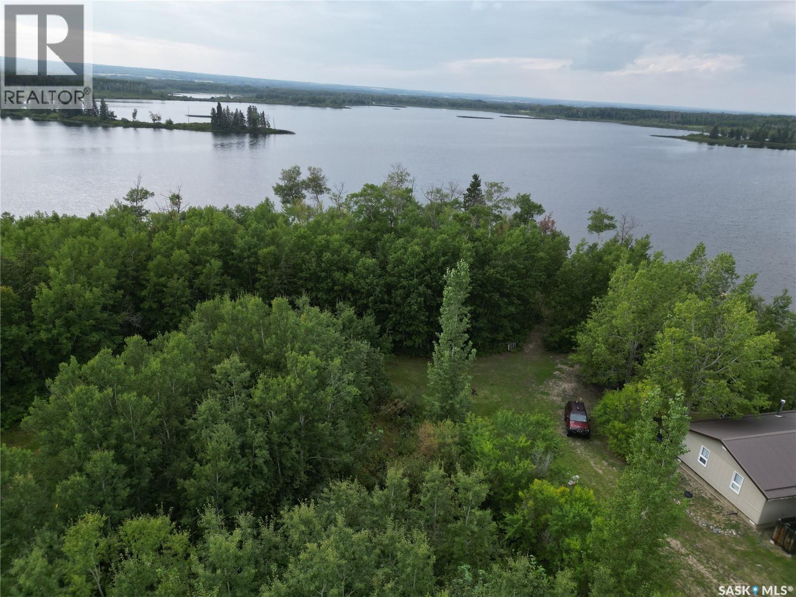Larson Lake Waterfront Cabins + 3 Quarters of land